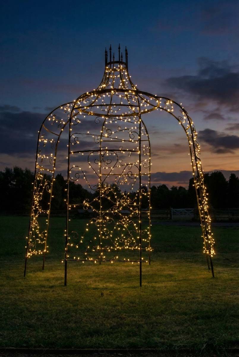 Digital representation of "Rapunzel" Tower Top Black Gazebo lit up at night