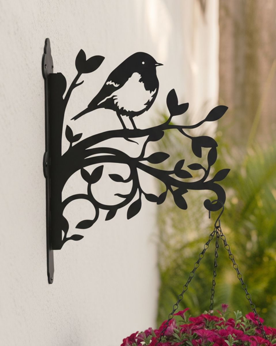 Digital Illustration of the Robin & Branches Iron Hanging Basket Bracket Mounted in a Contemporary Garden