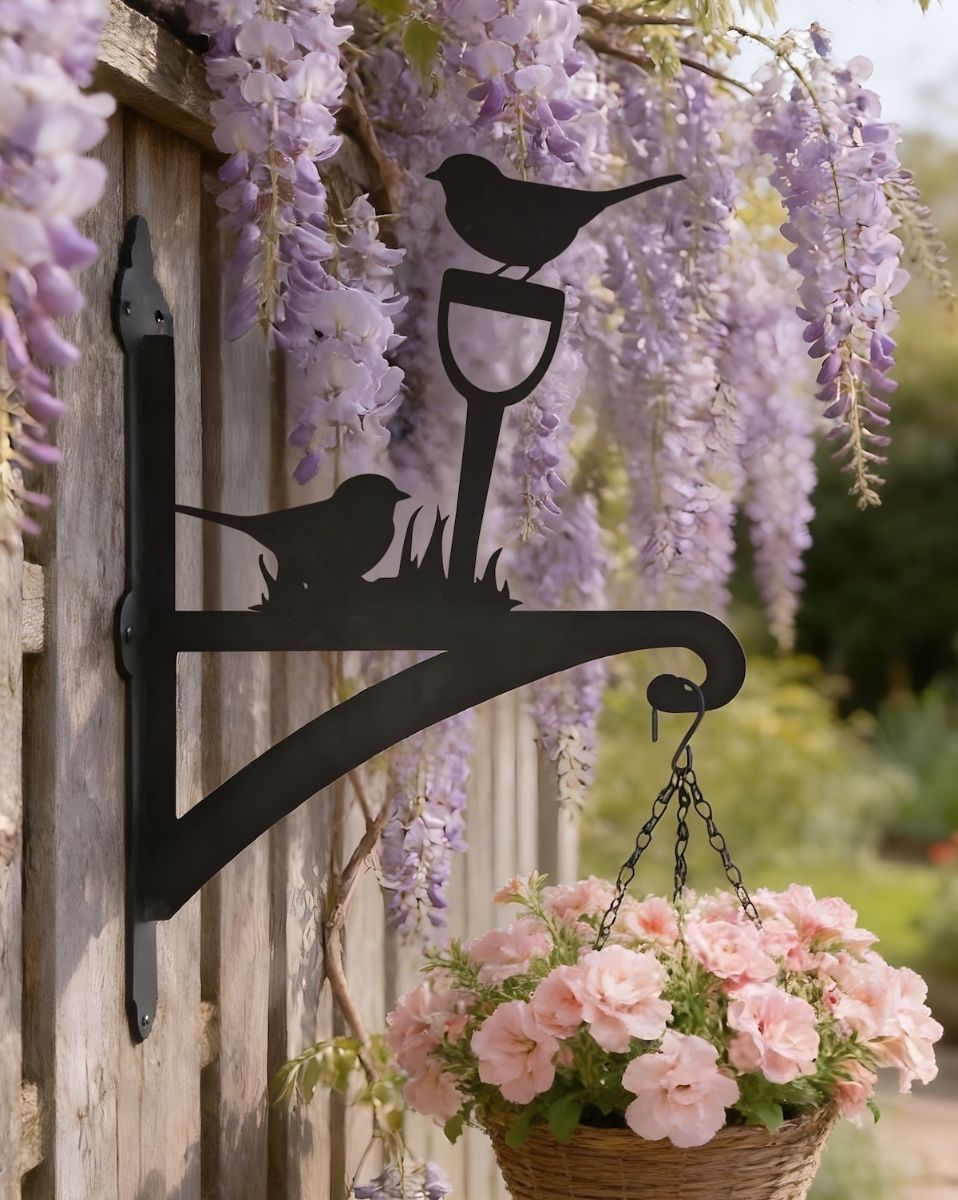 Digital representation of Robin Steel Hanging Basket Bracket mounted on a rustic fence
