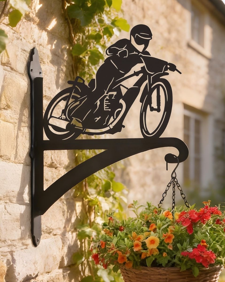 Digital representation of Speedway Motorbike Racing Iron Hanging Basket Bracket mounted on a cottage wall