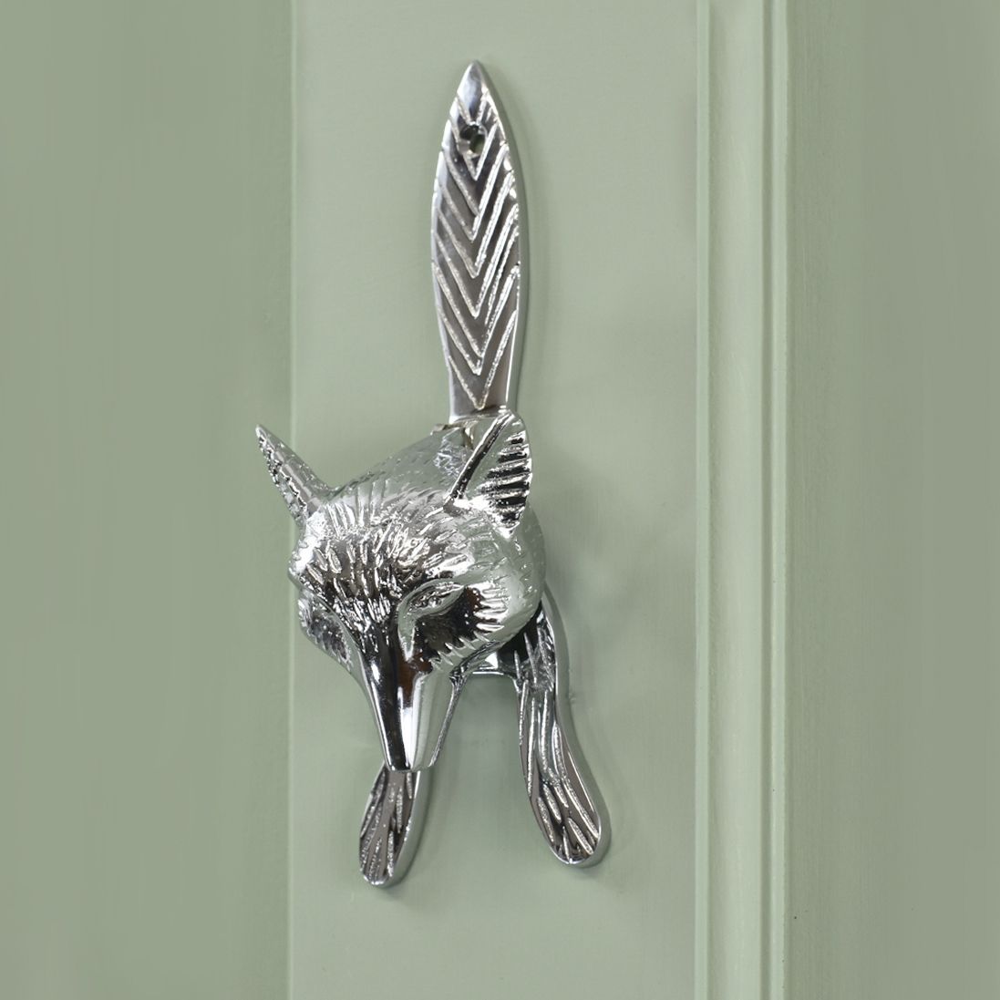 Bright Chrome Fox Door Knocker on Green door