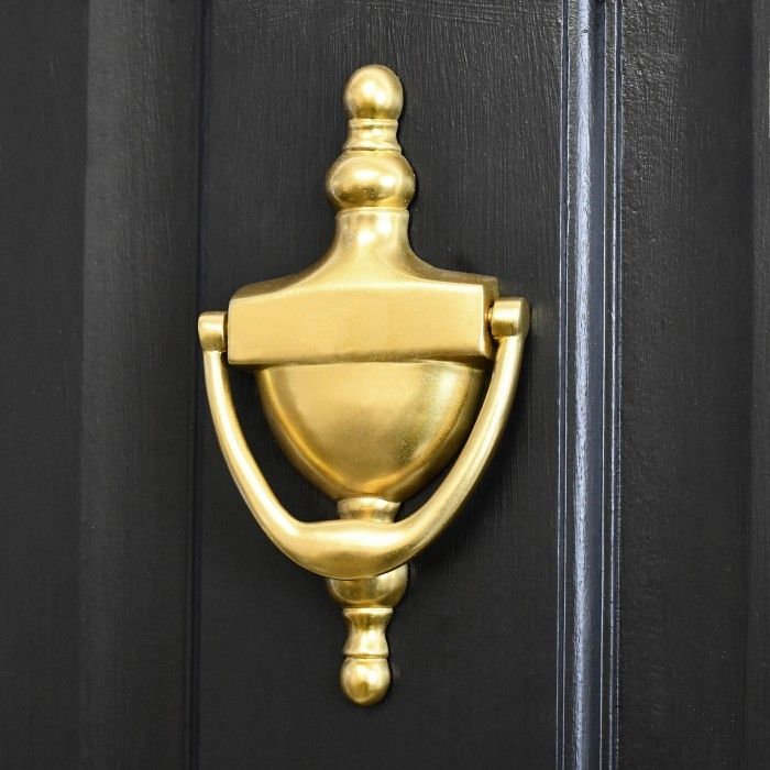 Gold Anodised Urn Door Knocker on a Black Door