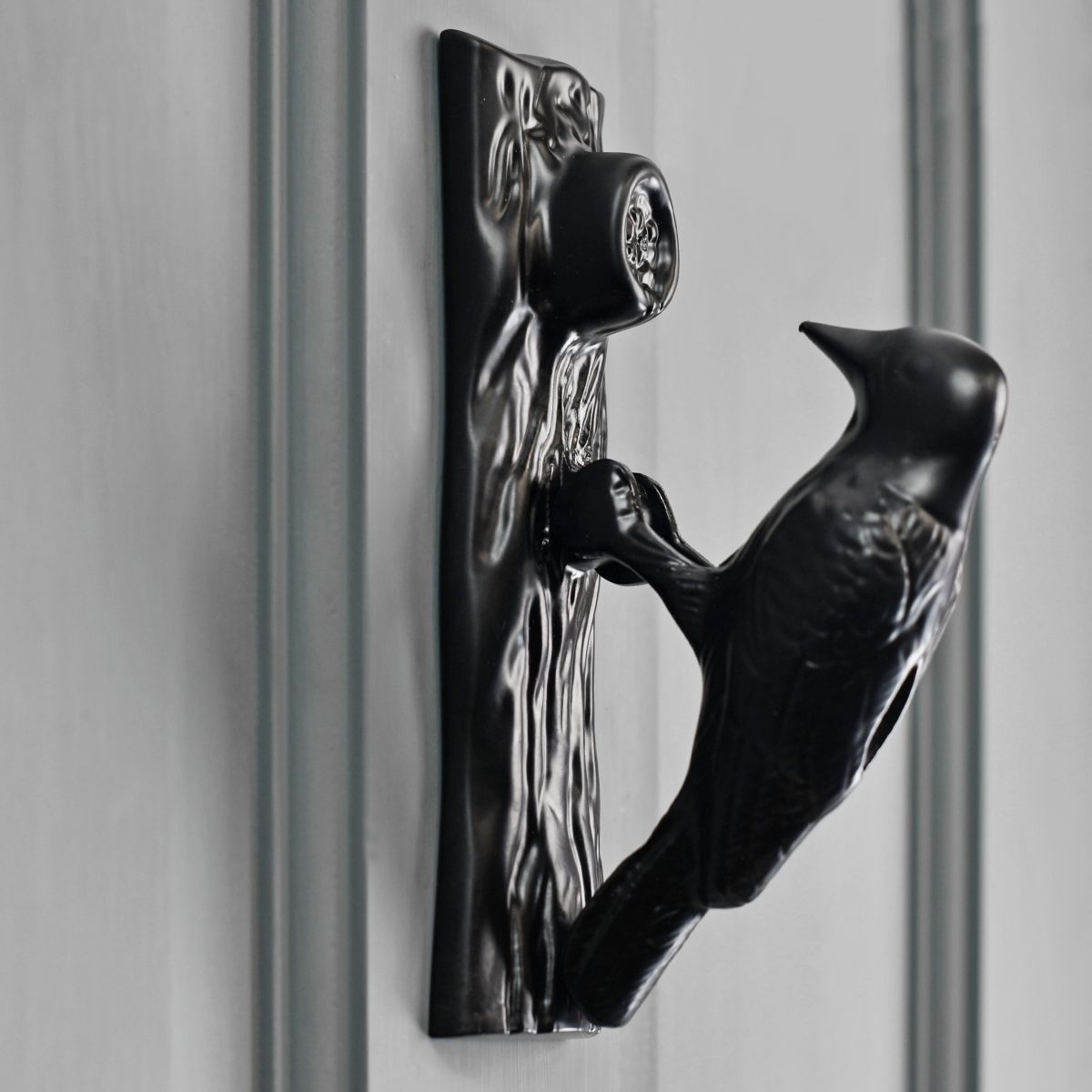 Woodpecker door knocker side view