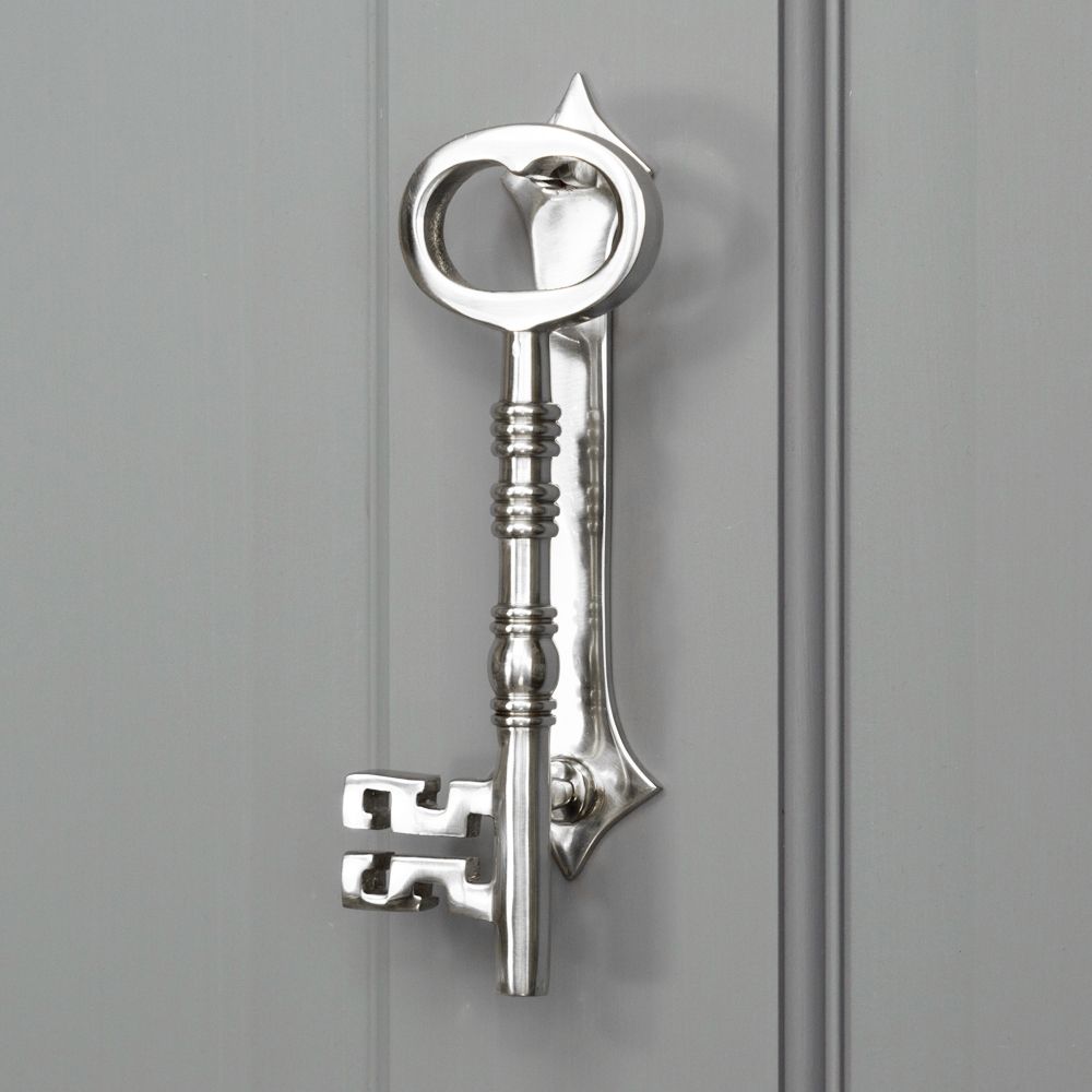 Bright Chrome Key door knocker on Grey Door