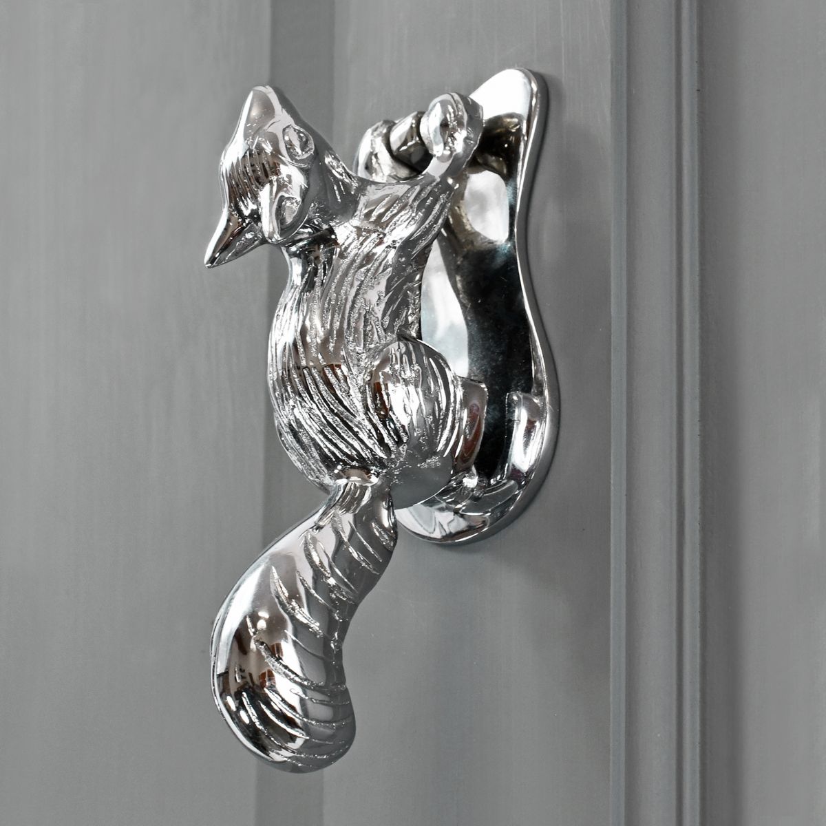 Bright Chrome Squirrel door knocker on Grey door