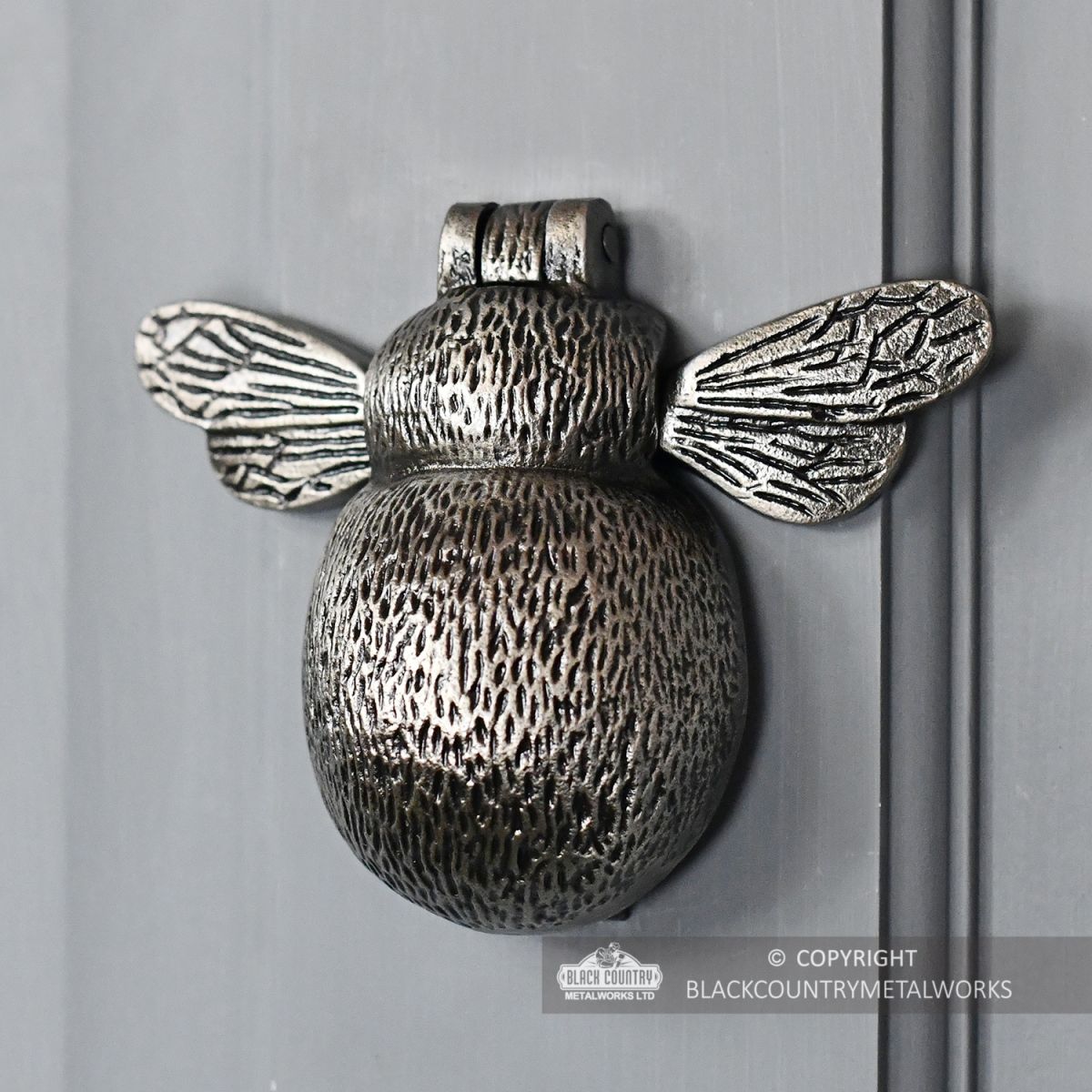 Antique Pewter Bumblebee Door Knocker in Situ on a Door