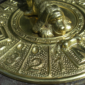 Close-up of the Detail on the Dog & Bone Sundial Close-up of the Detail on the Dog & Bone Sundial