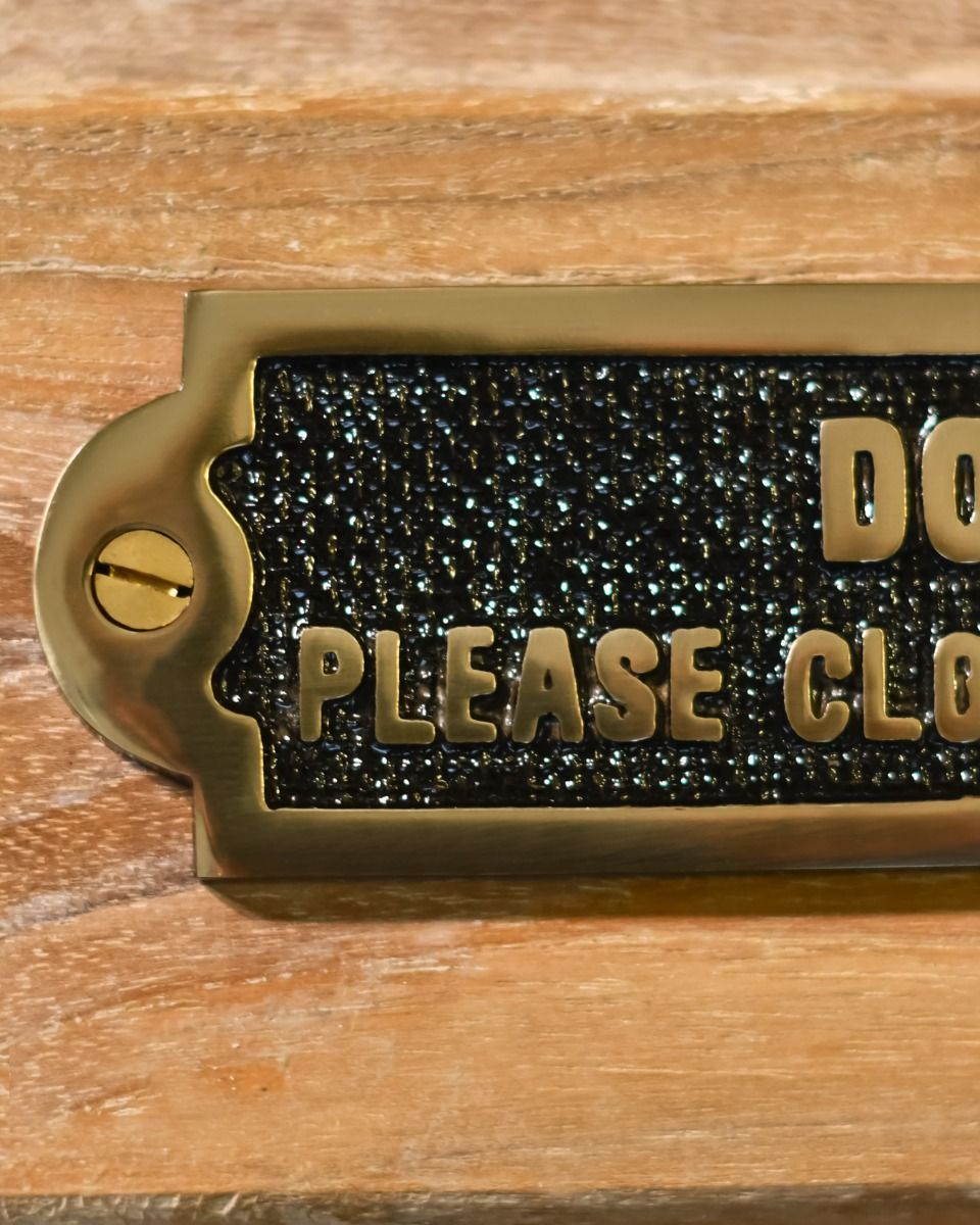 Dogs Please Close The Gate Solid Brass Sign Fixing Close Up Dogs Please Close The Gate Solid Brass Sign Fixing Close Up