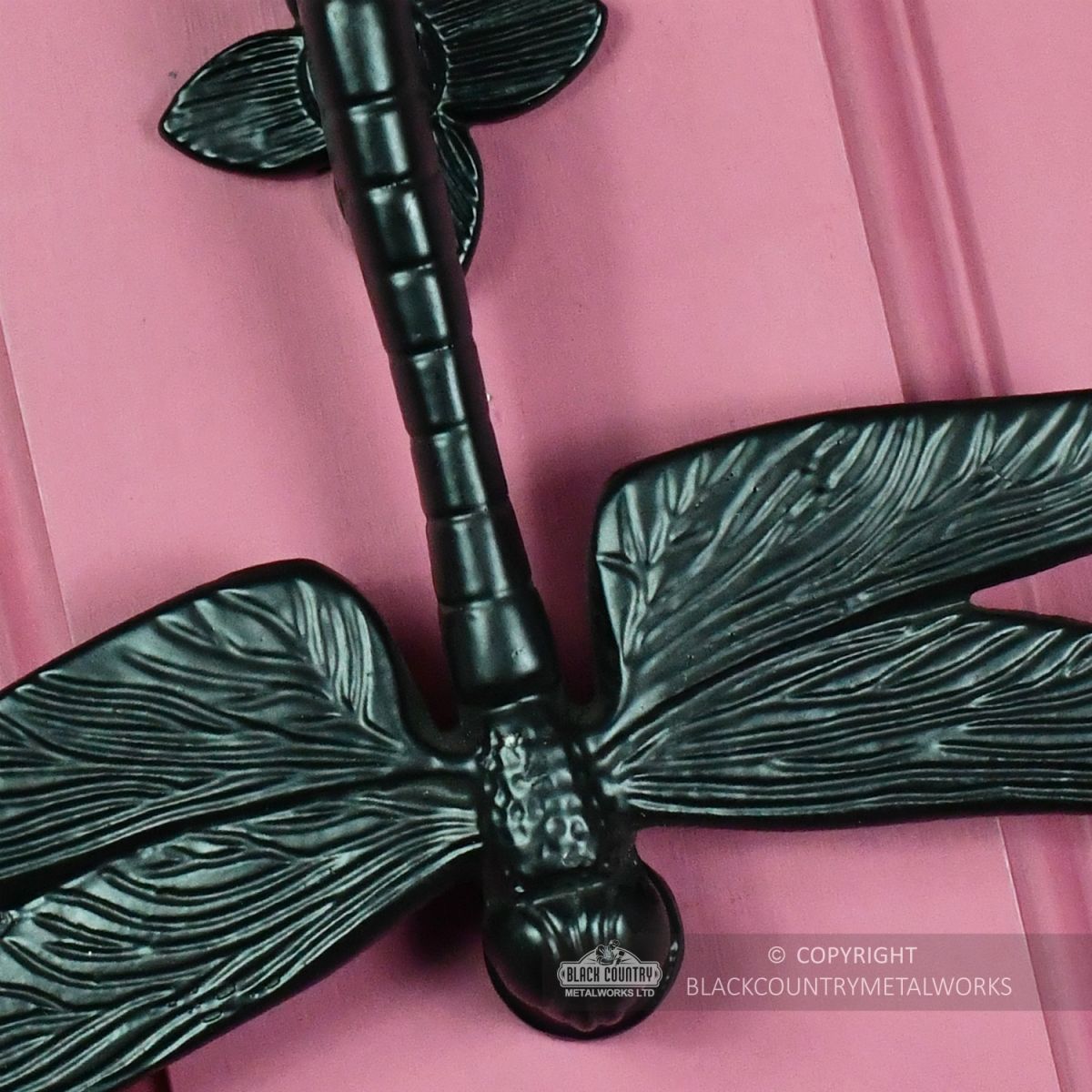 Dragonfly Door Knocker - Cast Iron On Pink Door