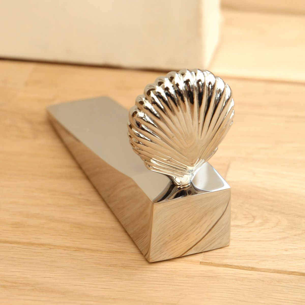 Bright Chrome Shell Door Stop