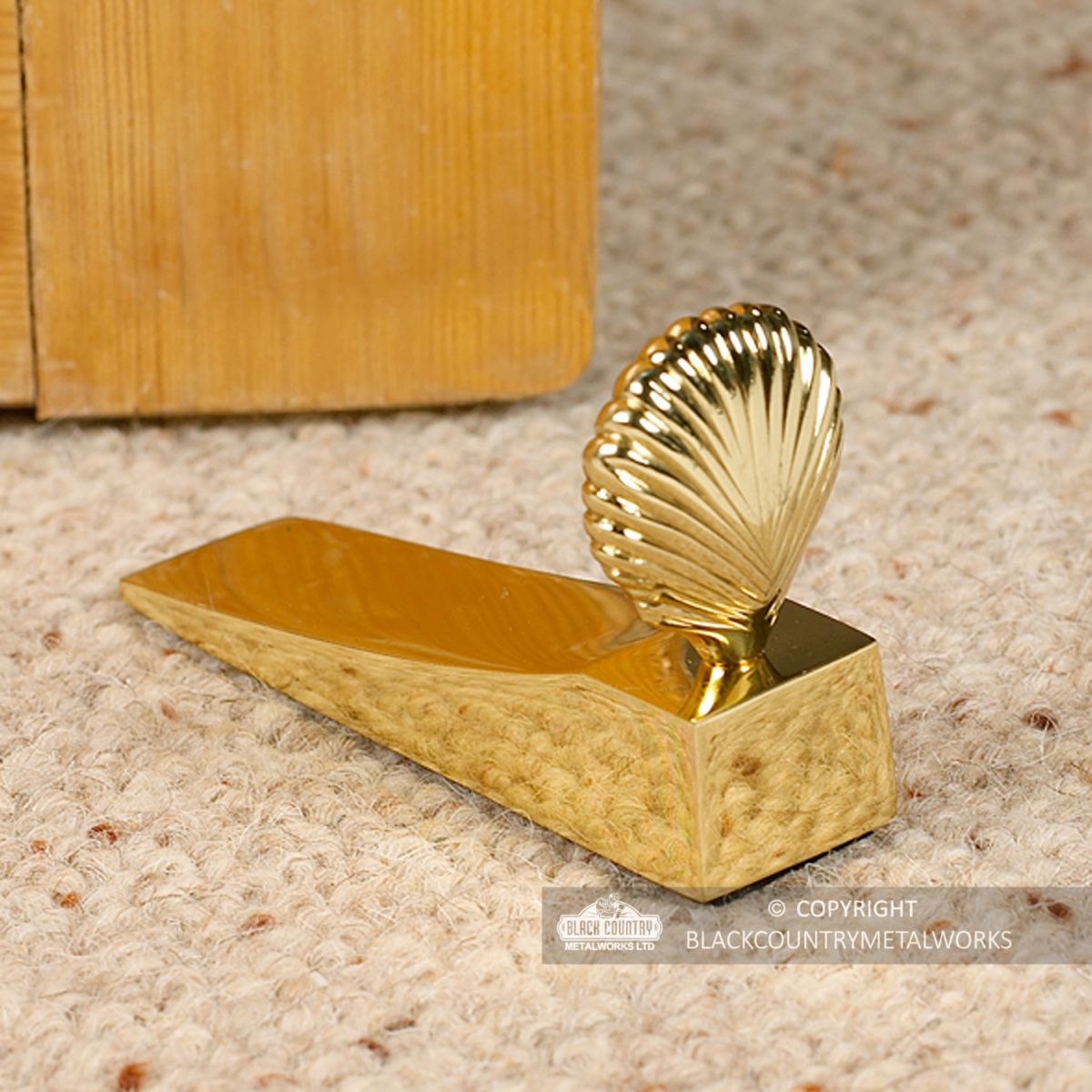 Shell Design Door Wedge in Situ Next to a Door