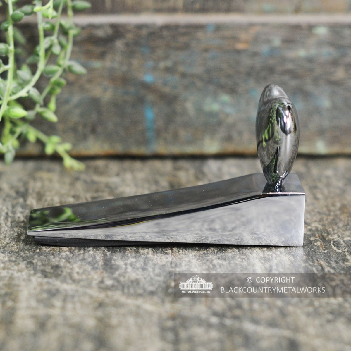 Side View of the Chrome Chubby Heart Door Wedge