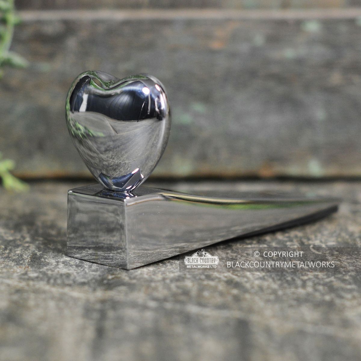 Back View of the Chrome Chubby Heart Door Wedge