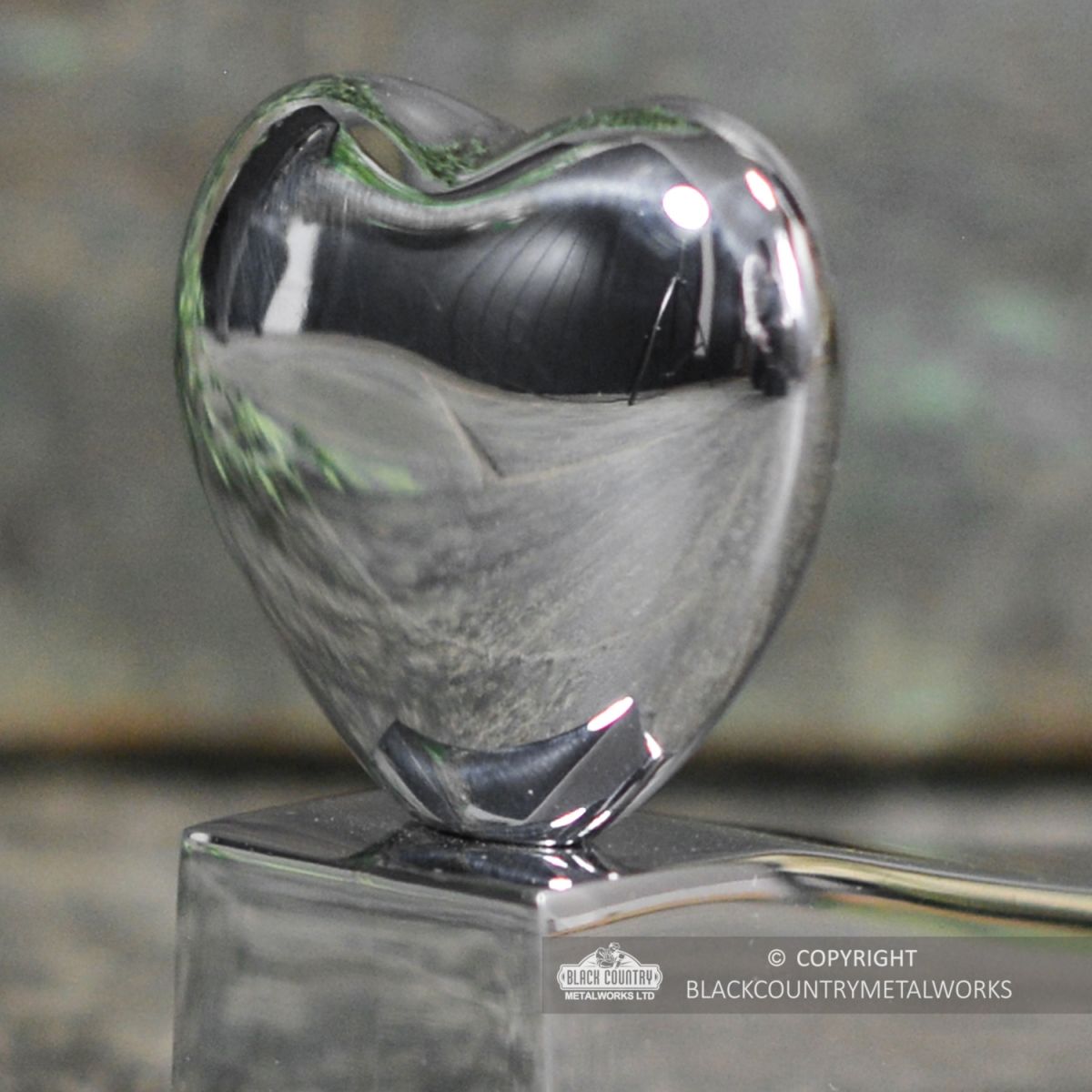 close-up of the Bright Chrome Heart Design