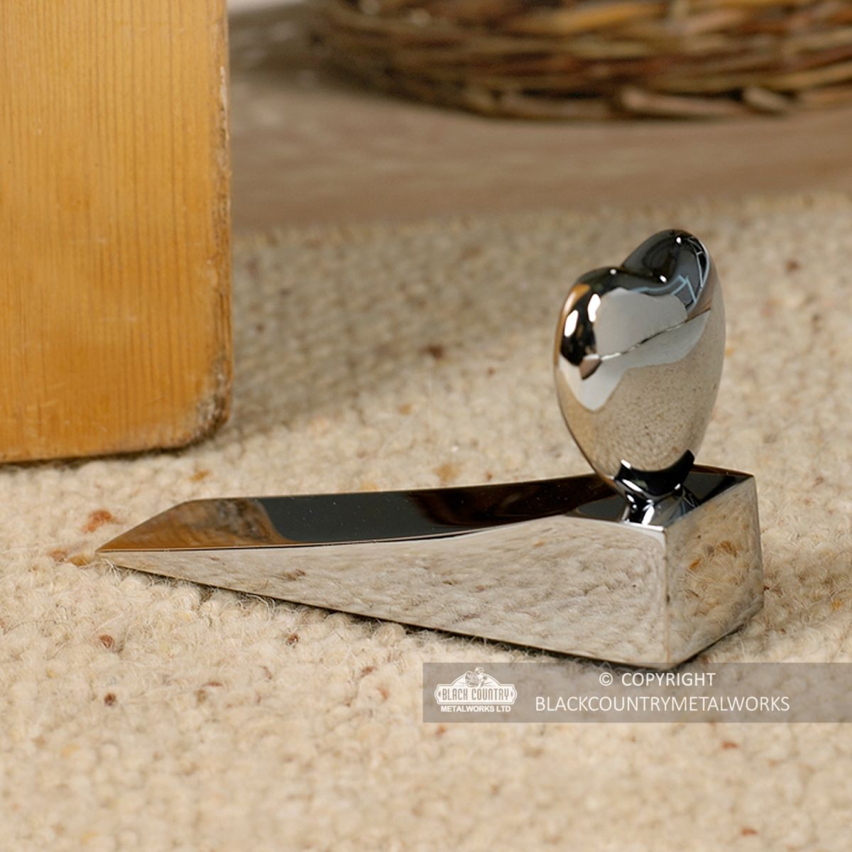 Bright Chrome Door Wedge in a Heart Design