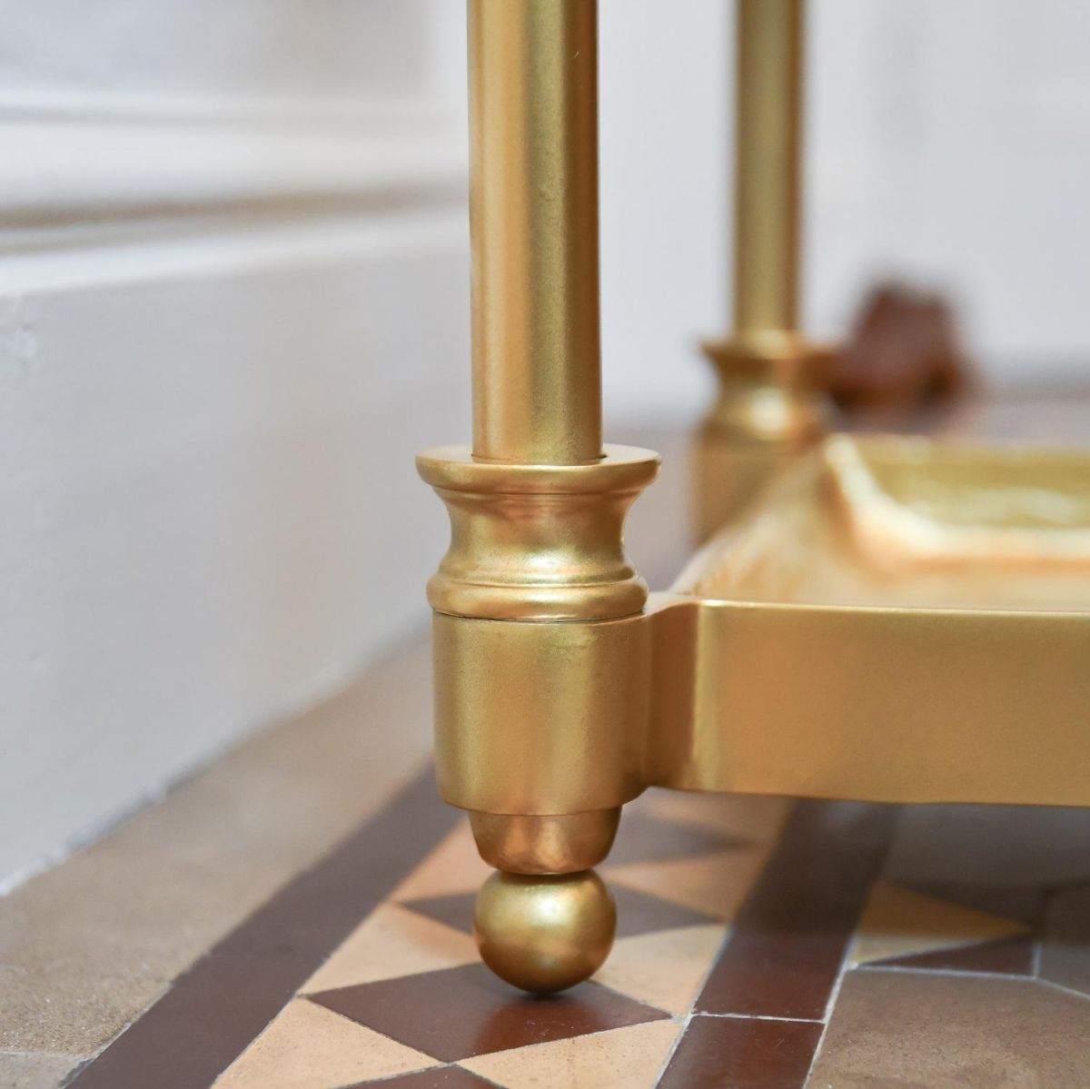 Close up of ball feet on umbrella holder  Close up of ball feet on umbrella holder