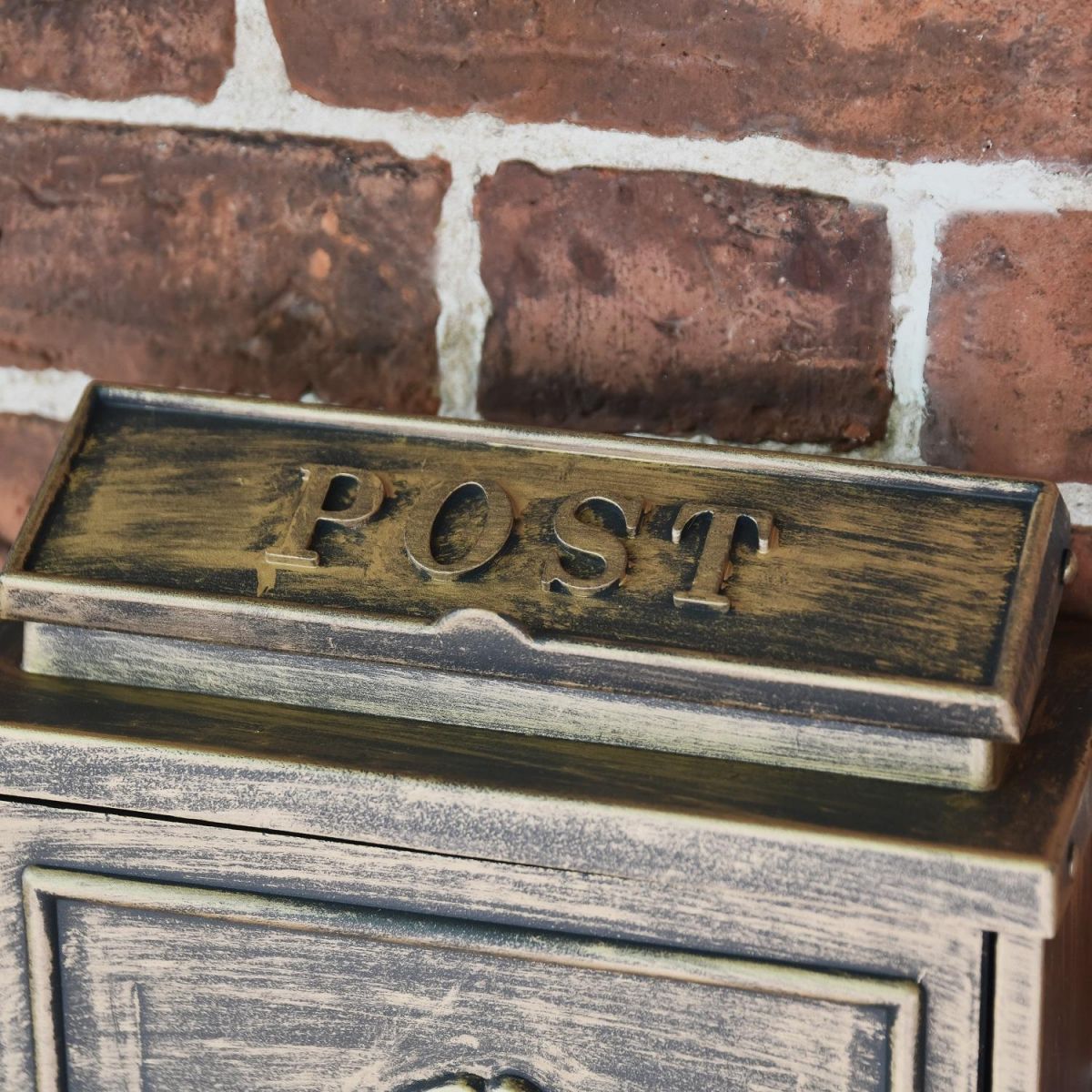 Close up of Lid on Brushed Bronze Wall Mounted Post Box  Close up of Lid on Brushed Bronze Wall Mounted Post Box