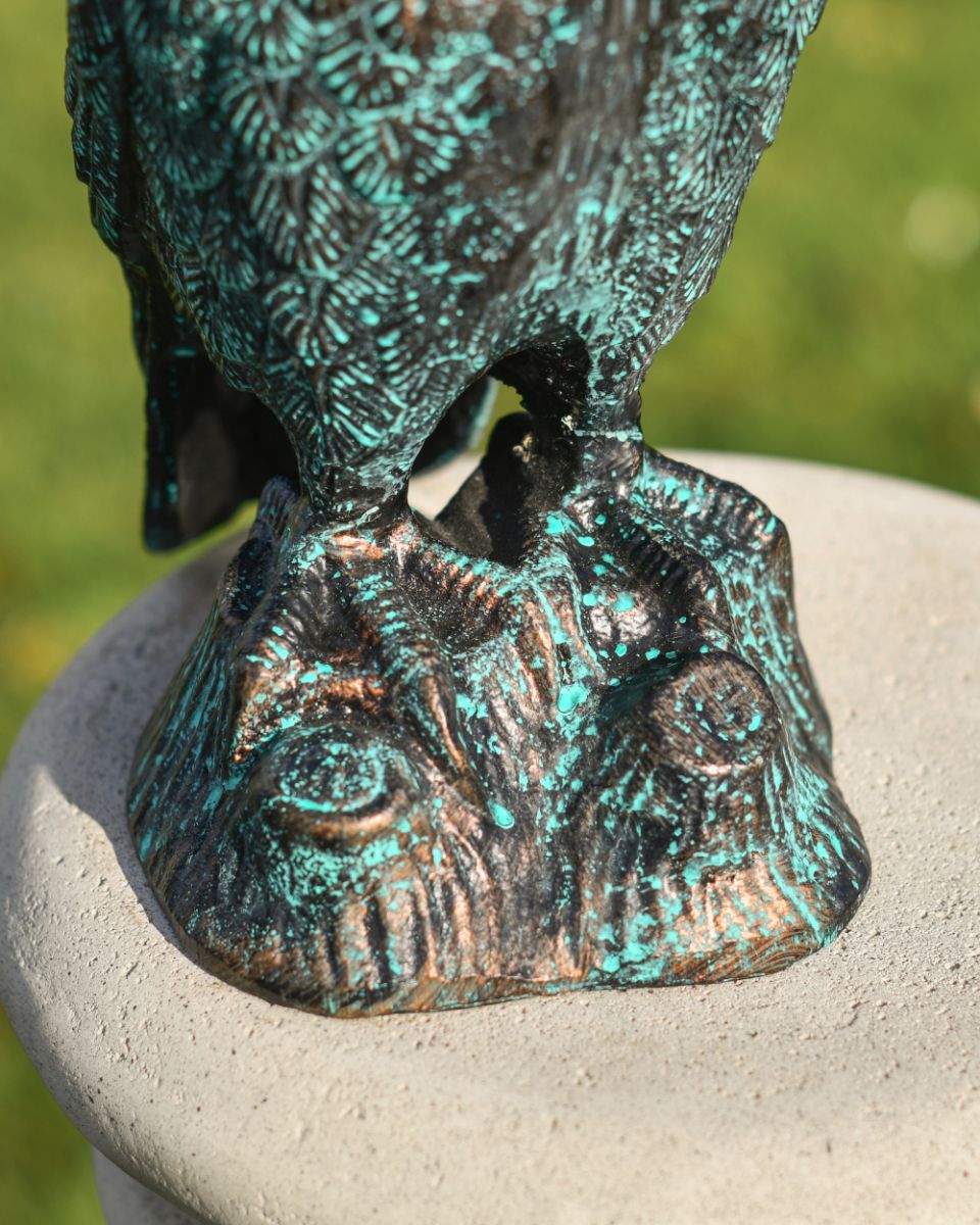 Feet and rock detail of Verdigris Finish Cast Aluminium Owl Sculpture Feet and rock detail of Verdigris Finish Cast Aluminium Owl Sculpture