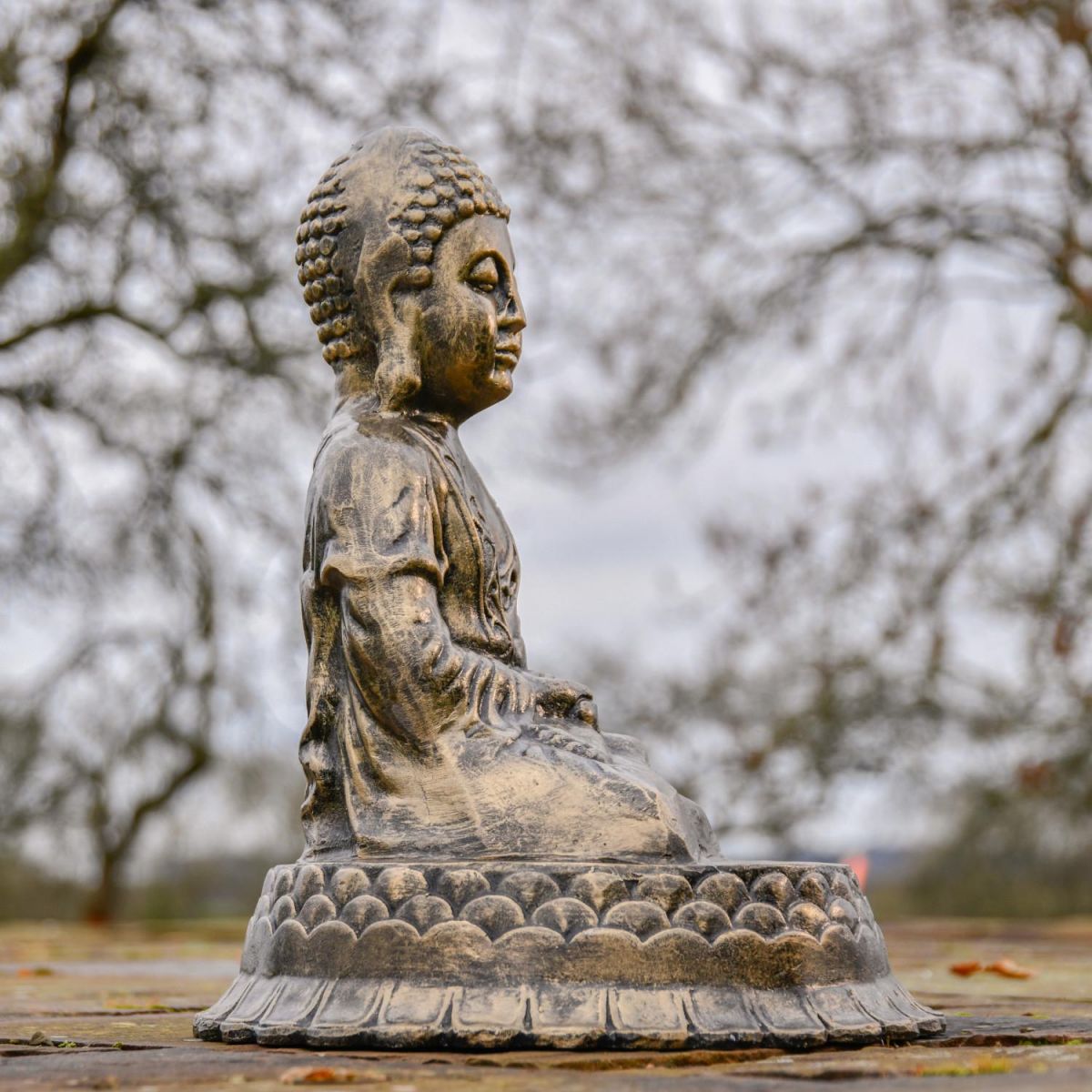 Side View of Traditional Hindu Buddha Garden Sculpture Side View of Traditional Hindu Buddha Garden Sculpture