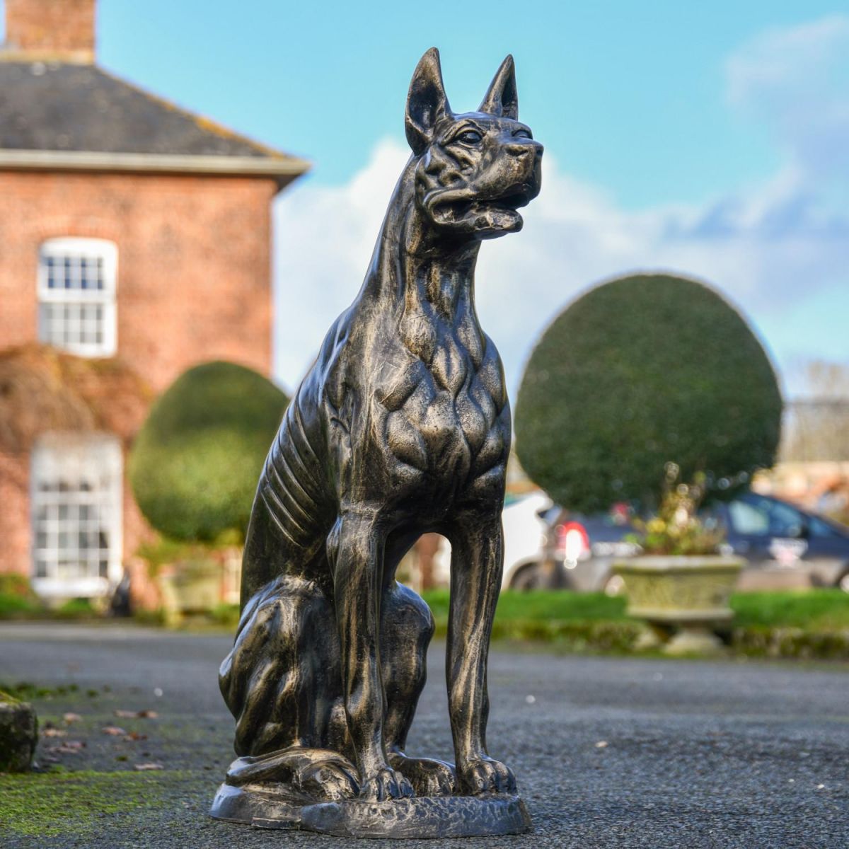 Egyptian Dog Sculpture in an Antique Gold Finish Egyptian Dog Sculpture in an Antique Gold Finish