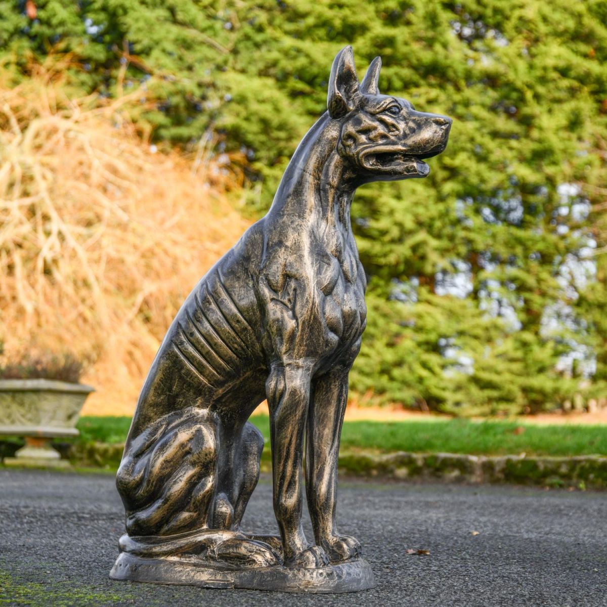 Side View of Egyptian Dog Sculpture in an Antique Gold Finish Side View of Egyptian Dog Sculpture in an Antique Gold Finish
