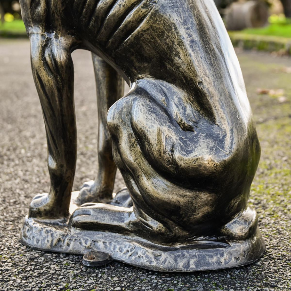 Side View of the Back of Egyptian Dog Sculpture in an Antique Gold Finish Side View of the Back of Egyptian Dog Sculpture in an Antique Gold Finish