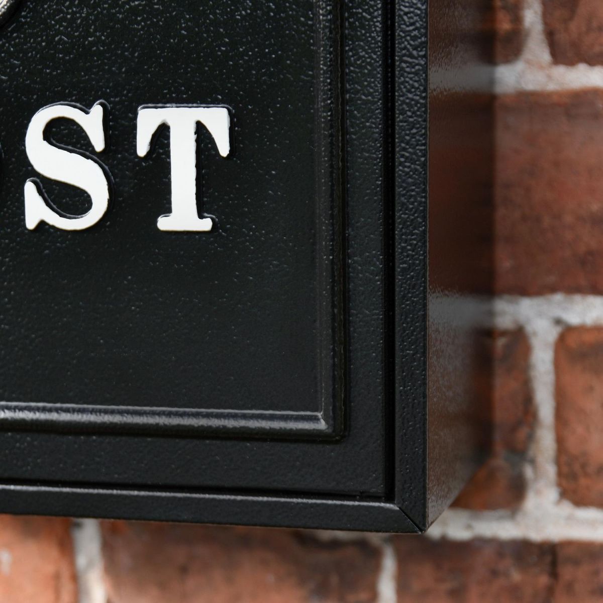 Close up of Black Wall Mounted Post Box  Close up of Black Wall Mounted Post Box