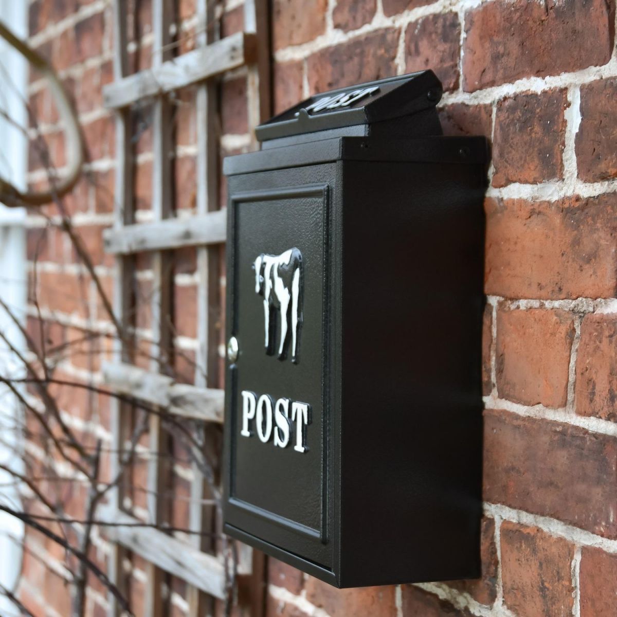 Side view of "Black & White Cow" Wall Mounted Post Box Side view of "Black & White Cow" Wall Mounted Post Box