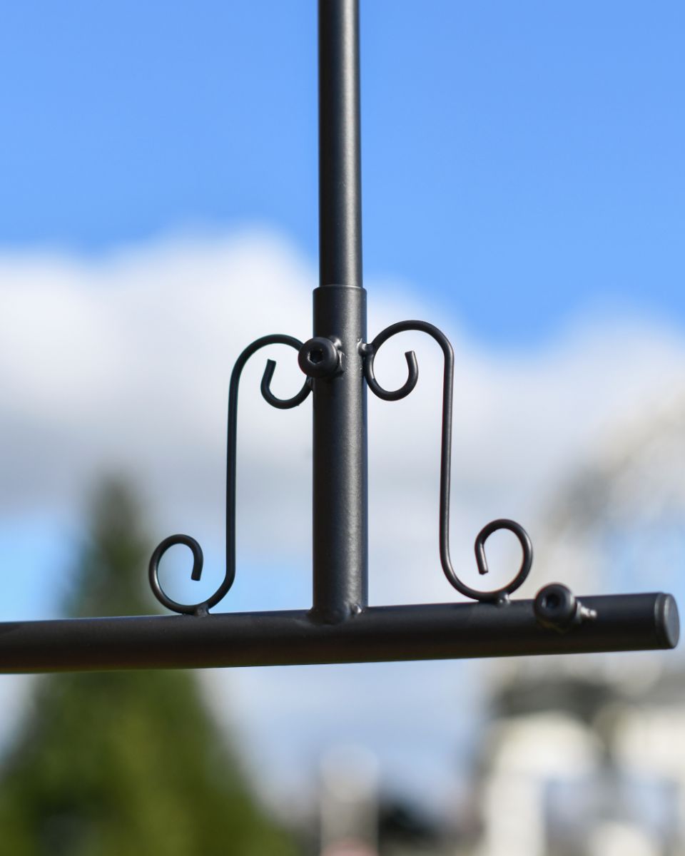 Scroll detail on Witch on her broom weathervane Scroll detail on Witch on her broom weathervane