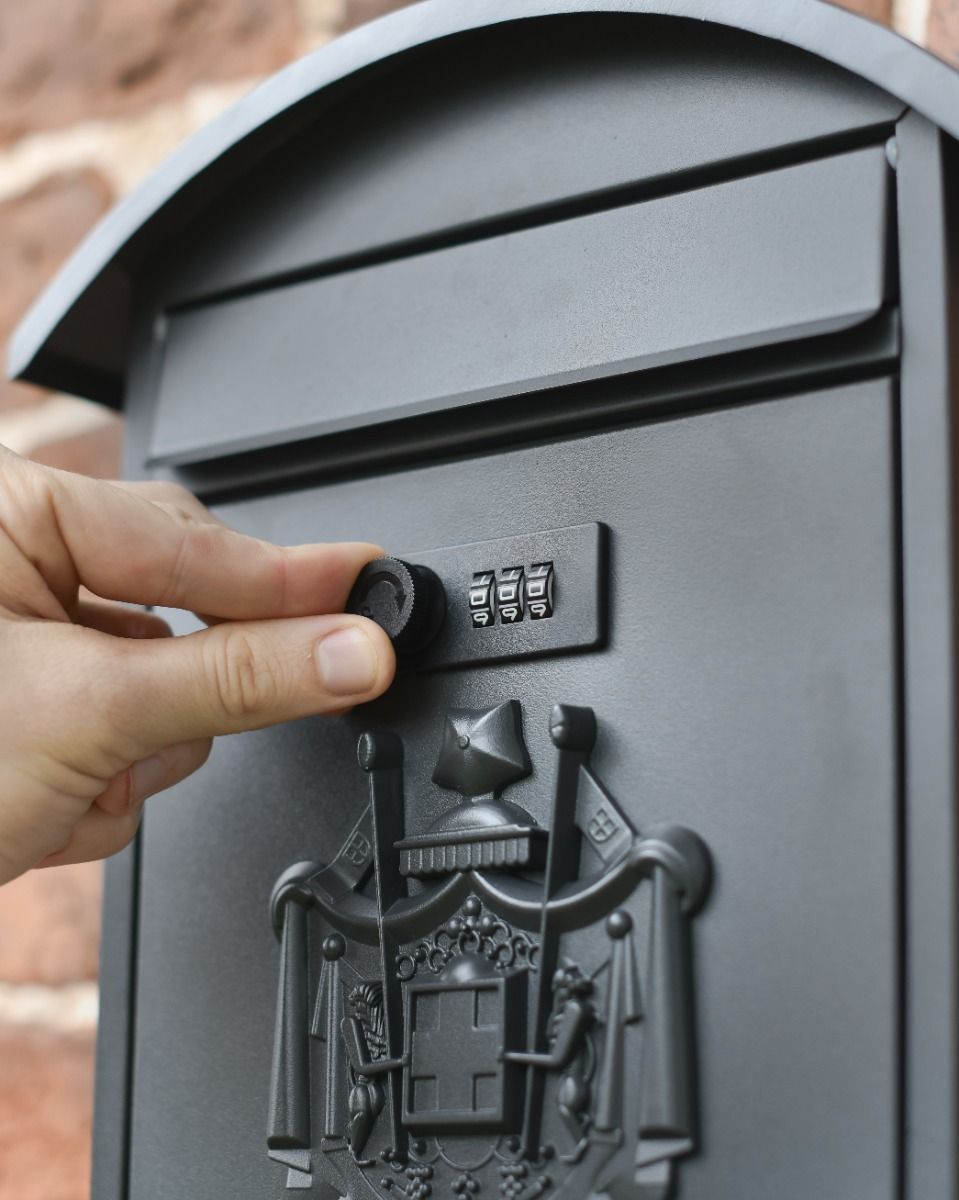 Turning Combination Lock on Post Box 
