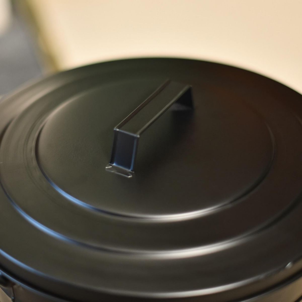 Close up of matching Lid on Ash Bucket  Close up of matching Lid on Ash Bucket