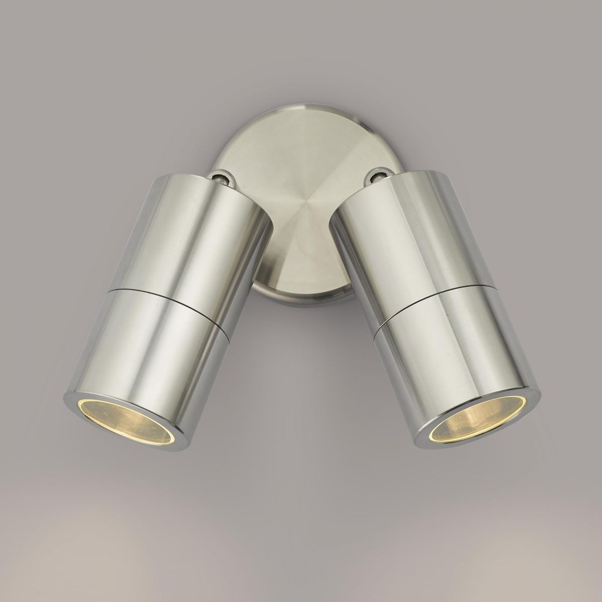Contemporary Dual Cylinder Wall Light on a Grey Wall Contemporary Dual Cylinder Wall Light on a Grey Wall