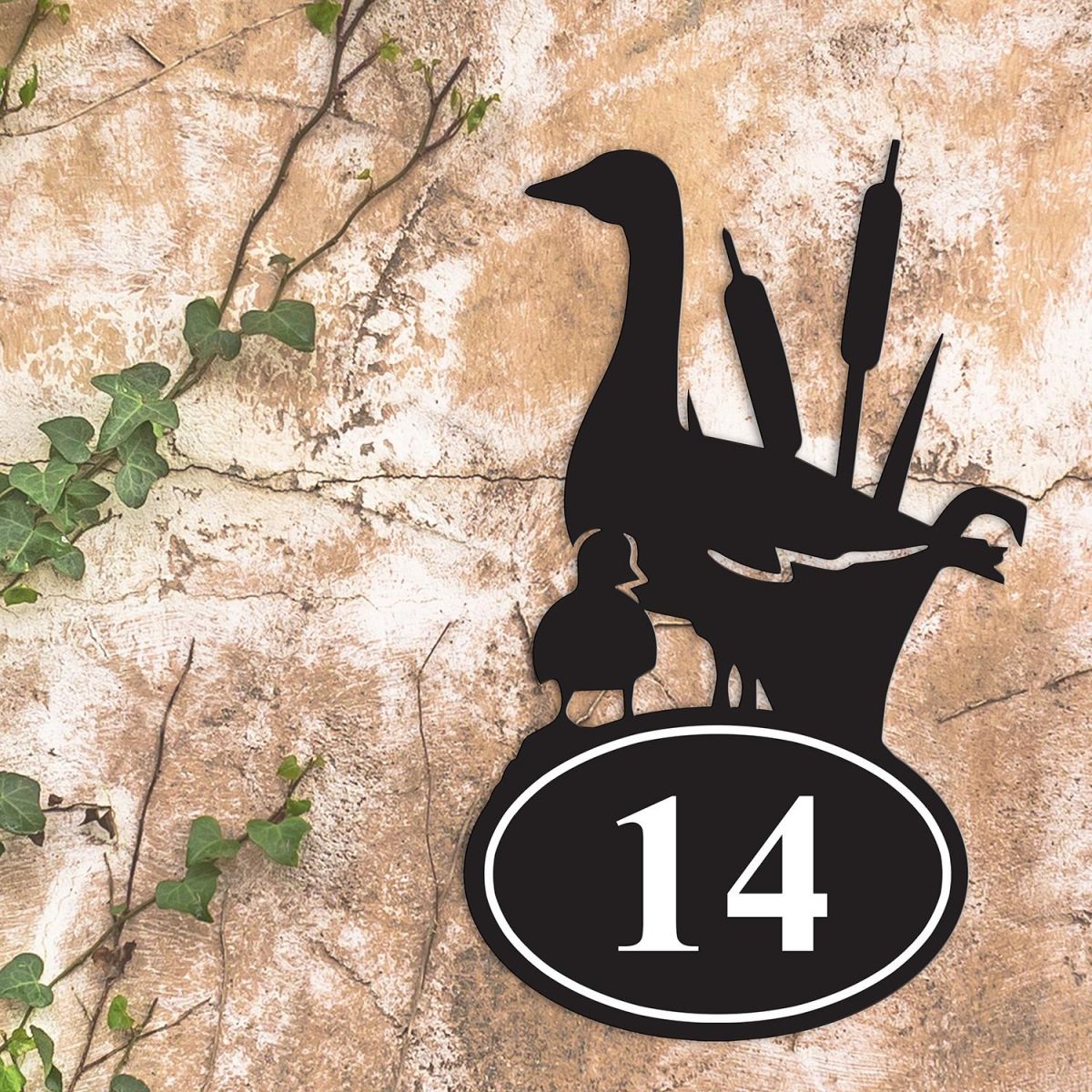 Duck Iron House Number Sign in Situ on a Rustic Wall 
