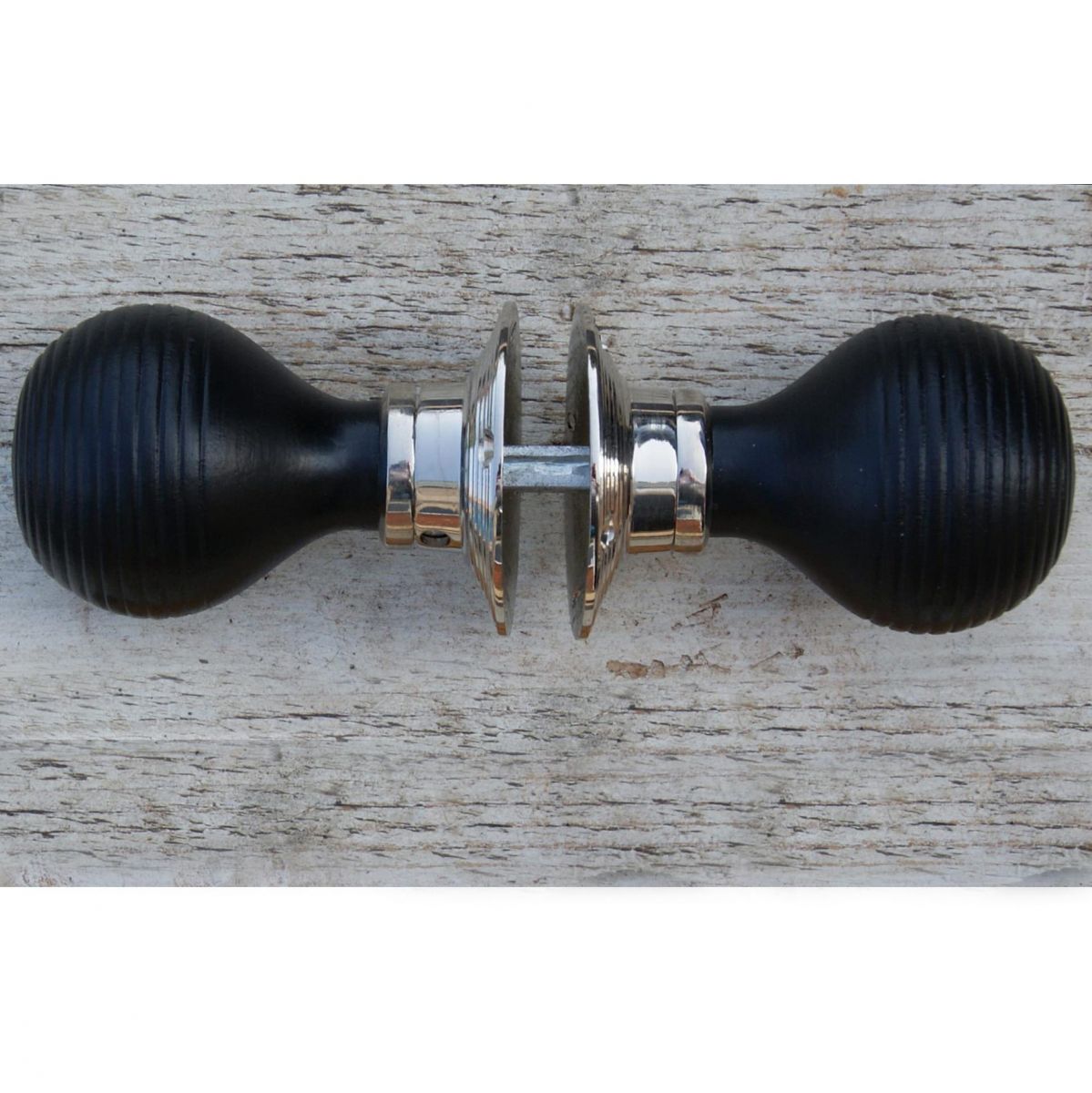 Ebony Round Beehive Door knobs and Bright Chrome Rose
