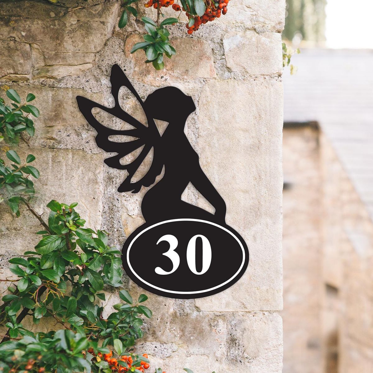 Bespoke Fairy Iron House Number Sign on a Garden Wall Bespoke Fairy Iron House Number Sign on a Garden Wall
