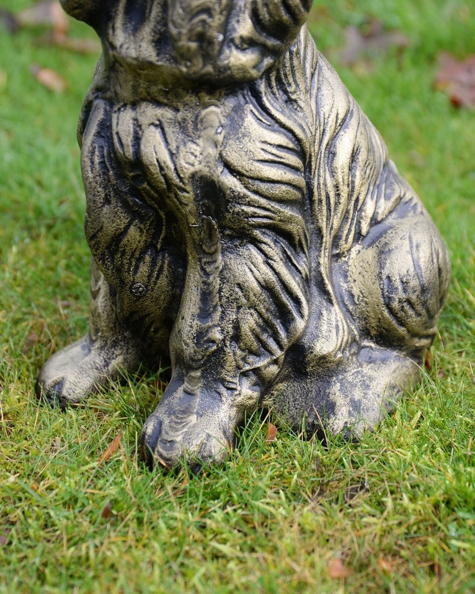 Brushed Gold Spaniel Dog garden Sculpture close up of front paws