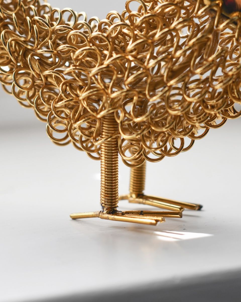 Close up of feet detail on recycled cockerel sculpture