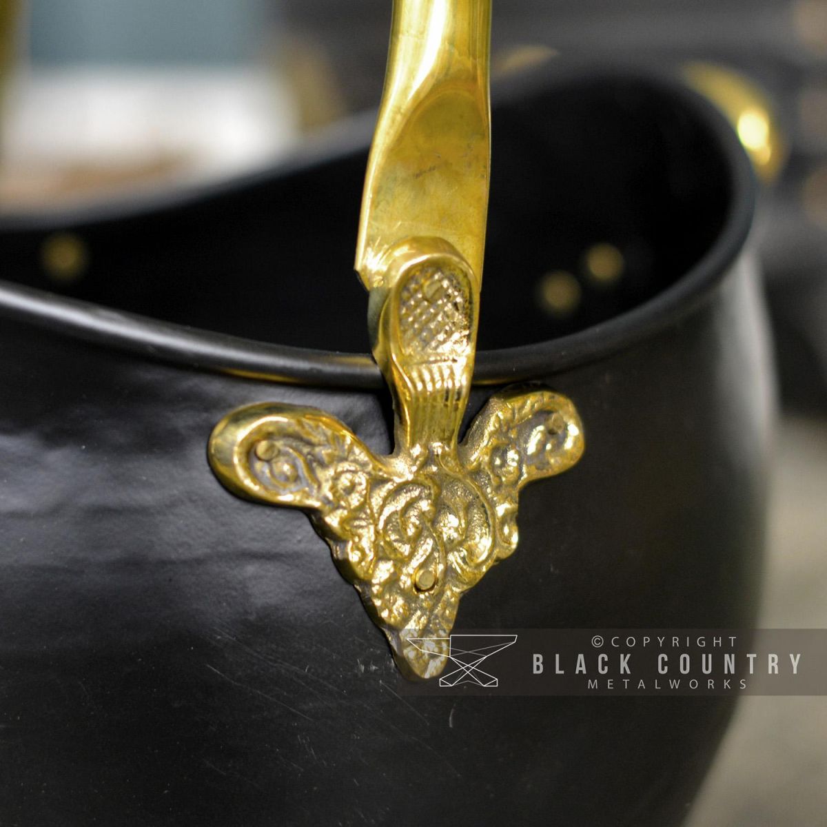 Brass Ornate Design on the Side of the Coal Bucket