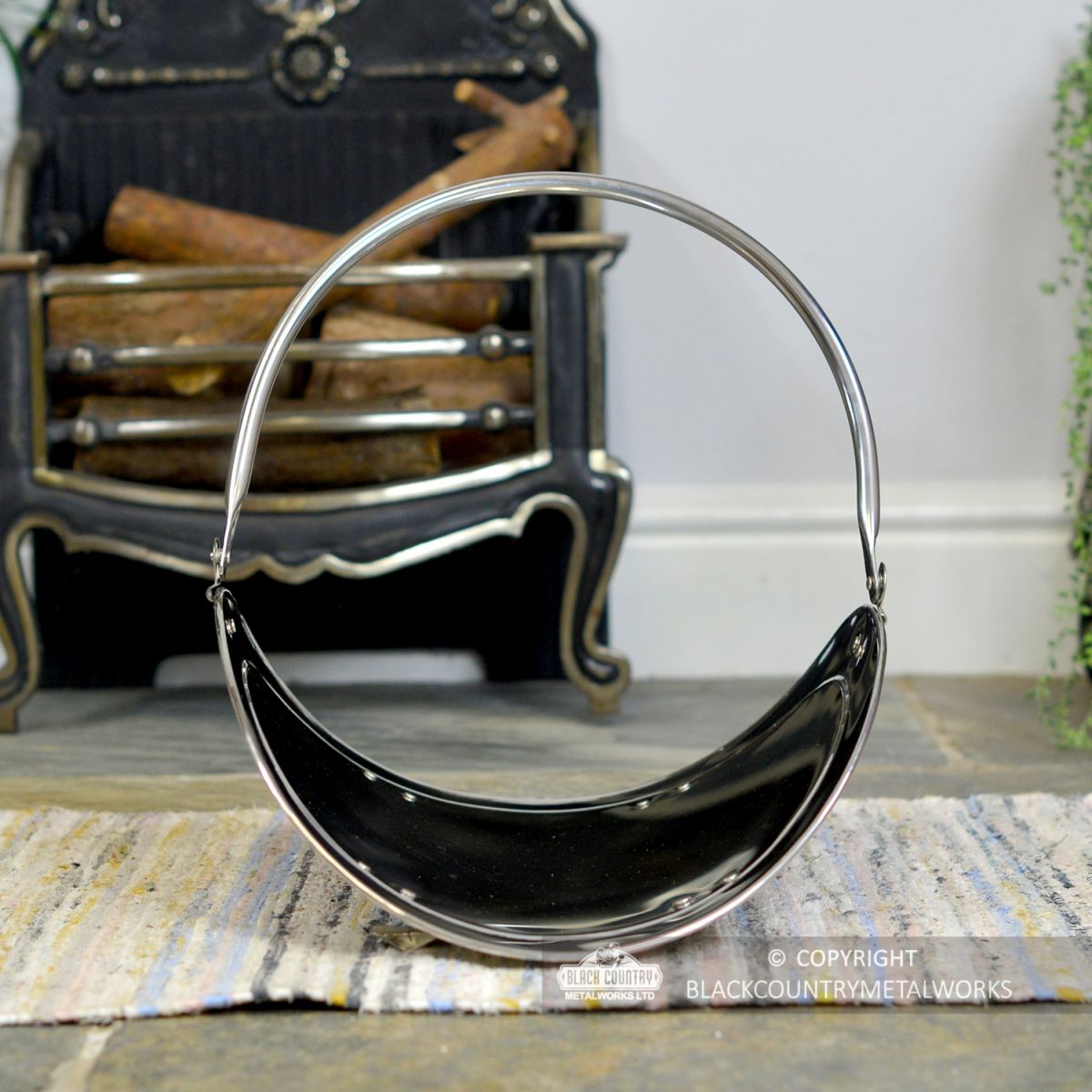 Front View of the "Evington" Stainless Steel Curved Log Basket