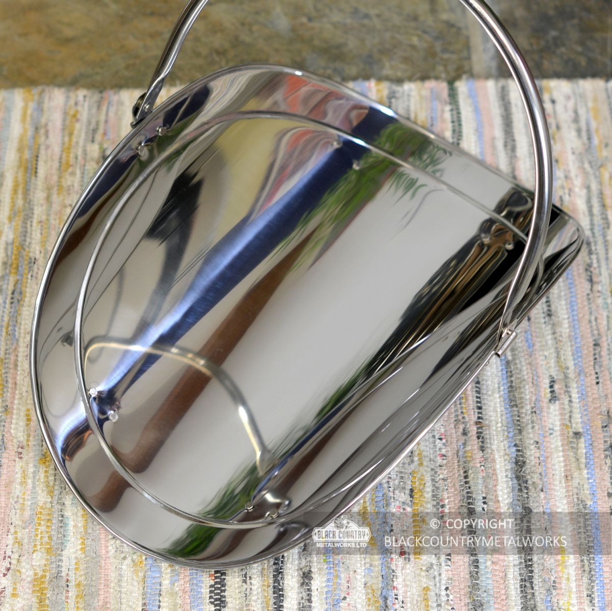 Top View of the "Evington" Stainless Steel Curved Log Basket