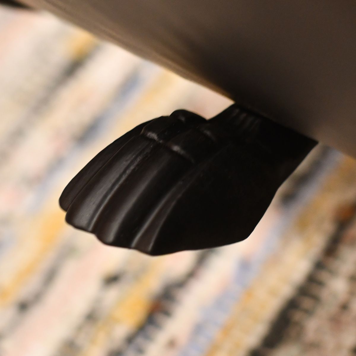 close up of foot under log holder