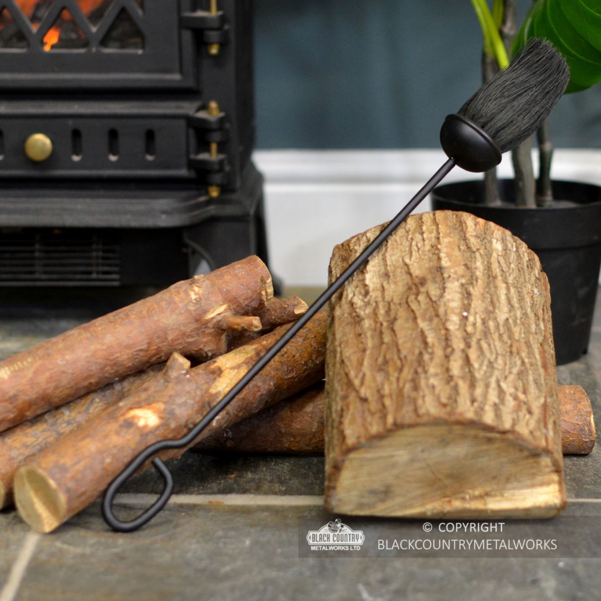 Traditional Black Fireside Brush in Situ Next to the Fireplace