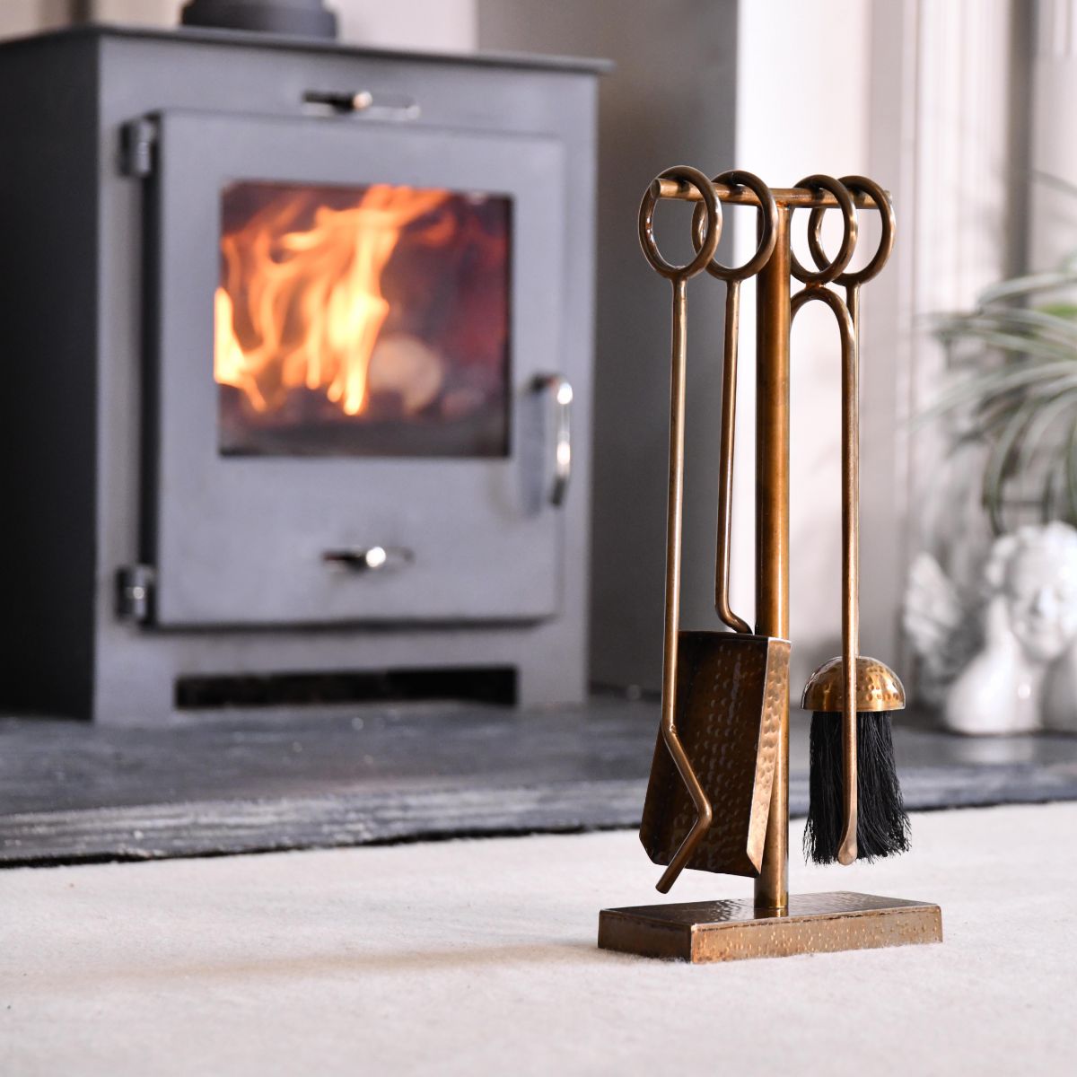 Midleton Hammered Antique Brass Companion Set in Living Room 