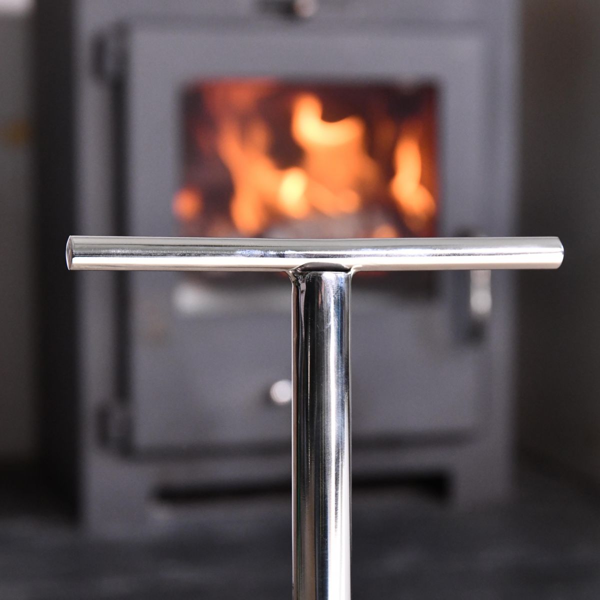 Close up of T-Bar on Hammered Polished Steel Companion Set  Close up of T-Bar on Hammered Polished Steel Companion Set