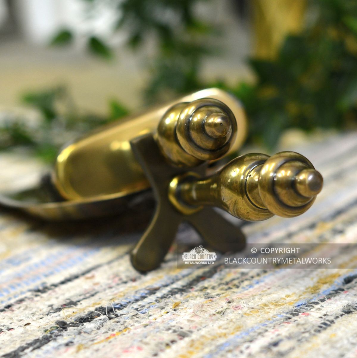 Close-up of the Ends of the Handle and the Stand on the Pan