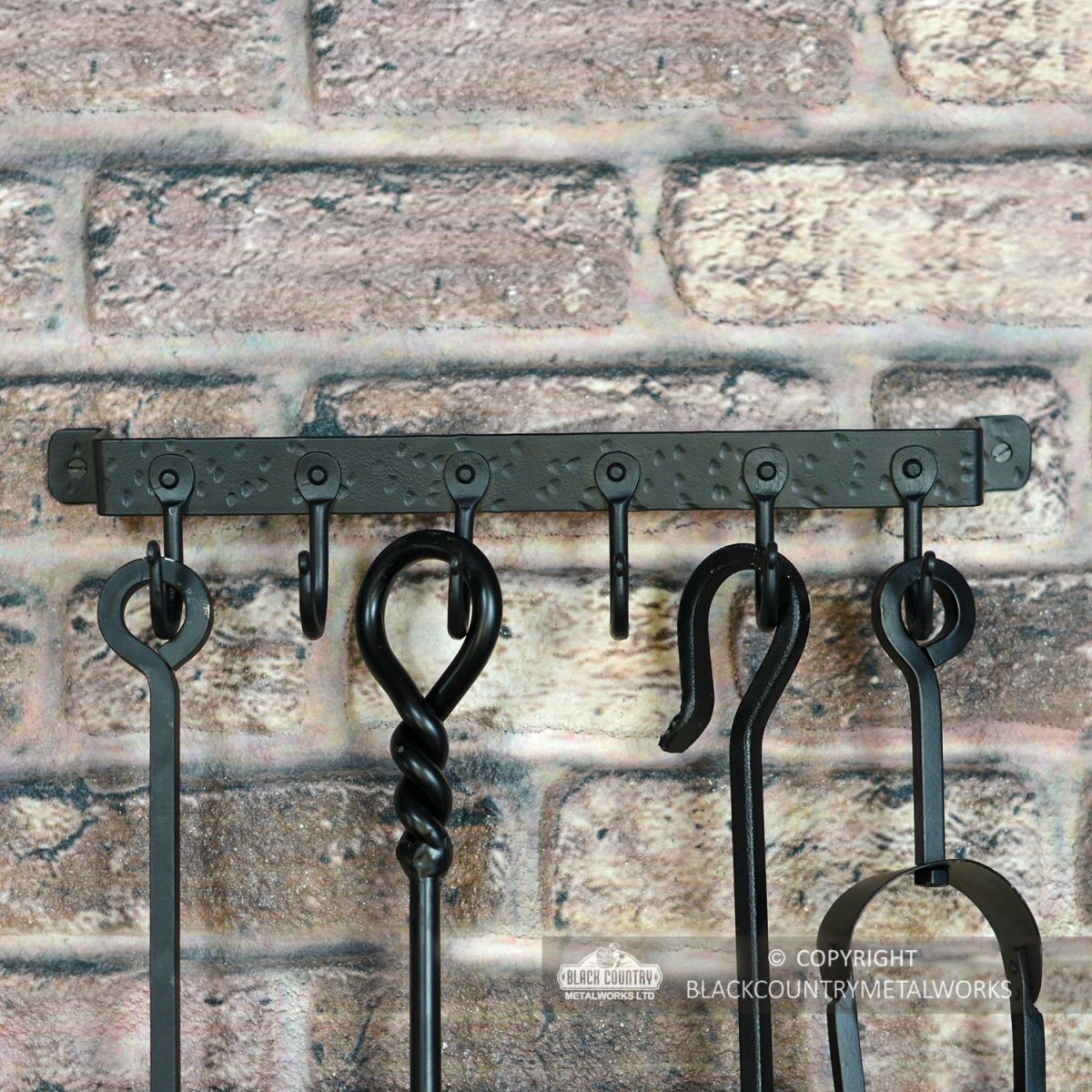 6 Hook "Blacksmith Style" Wall Mounted Fireside Tool Rack in Situ on the Wall holding tools