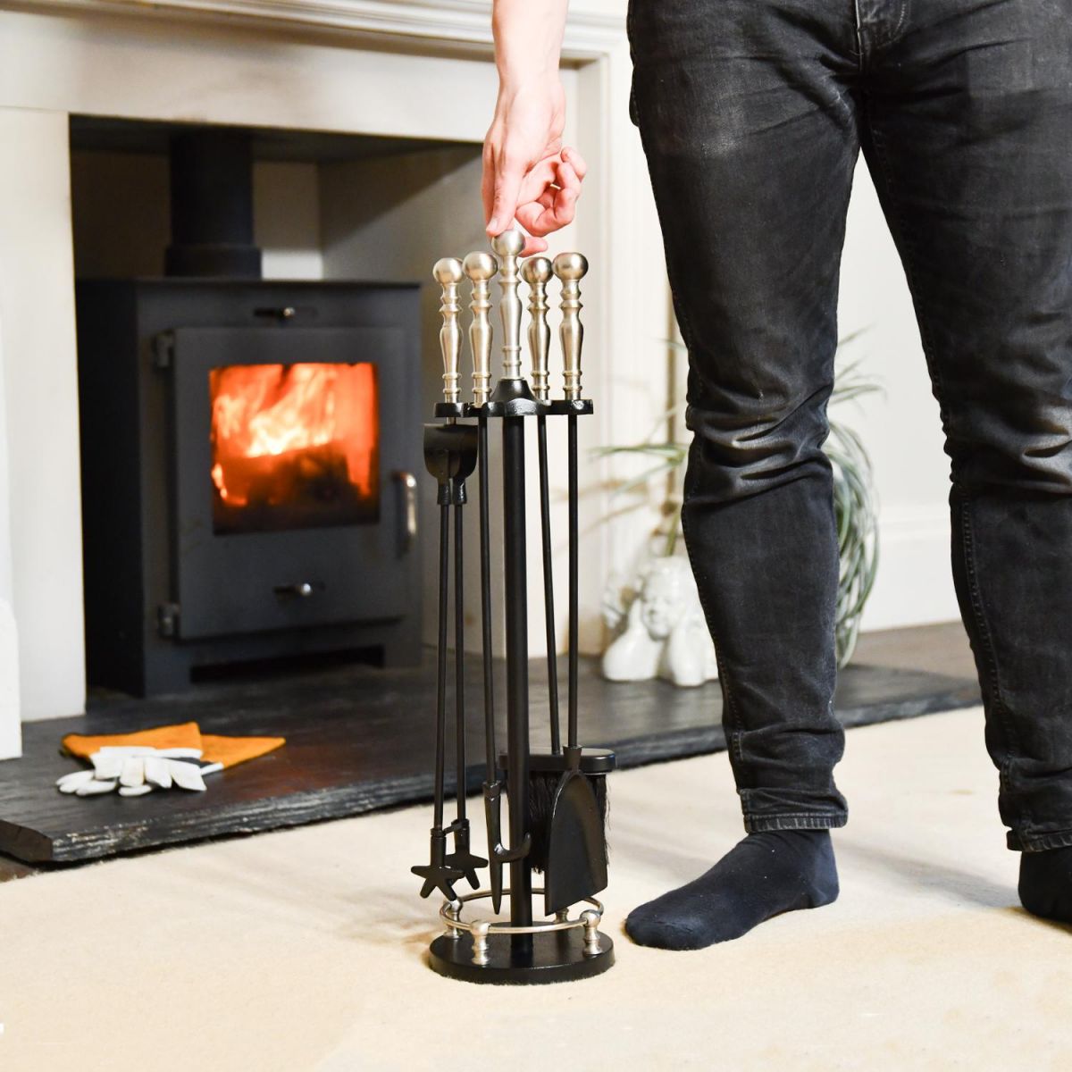 Male for scale next to Traditional Iron Companion Set with Brushed Chrome Handles 