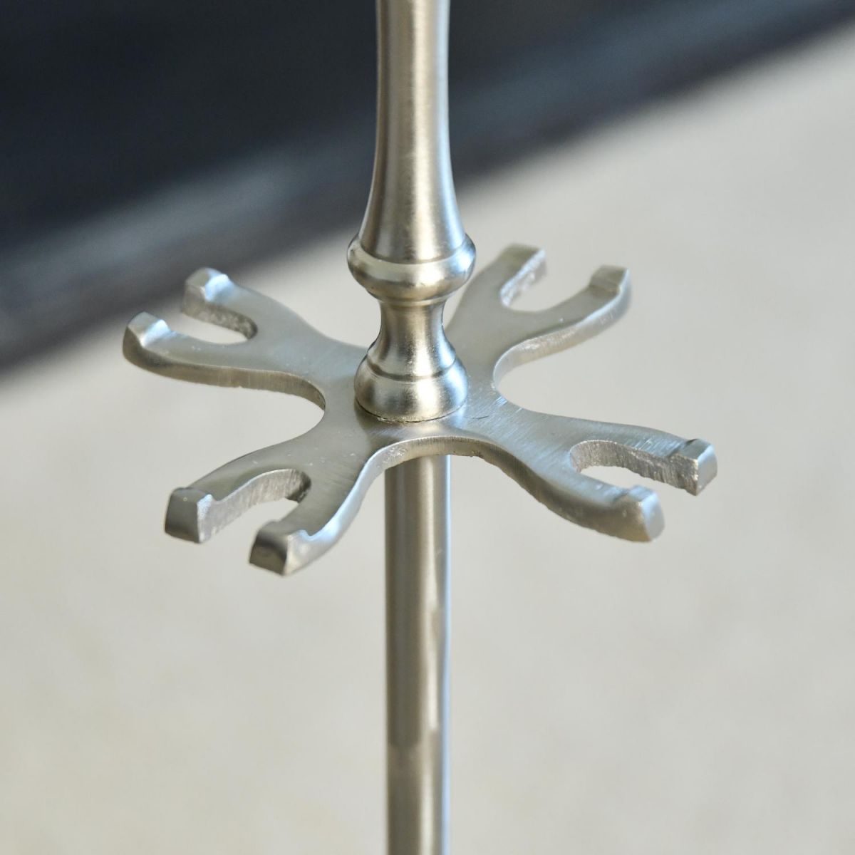Close up of Polished Pewter Tool Stand  Close up of Polished Pewter Tool Stand