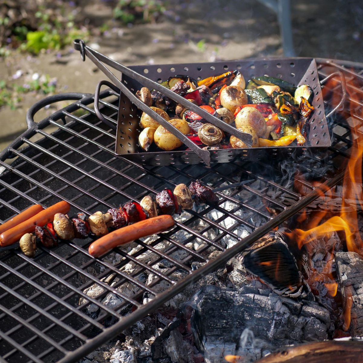 Fire Bowl Half Grill in Use Whilst Cooking Food
