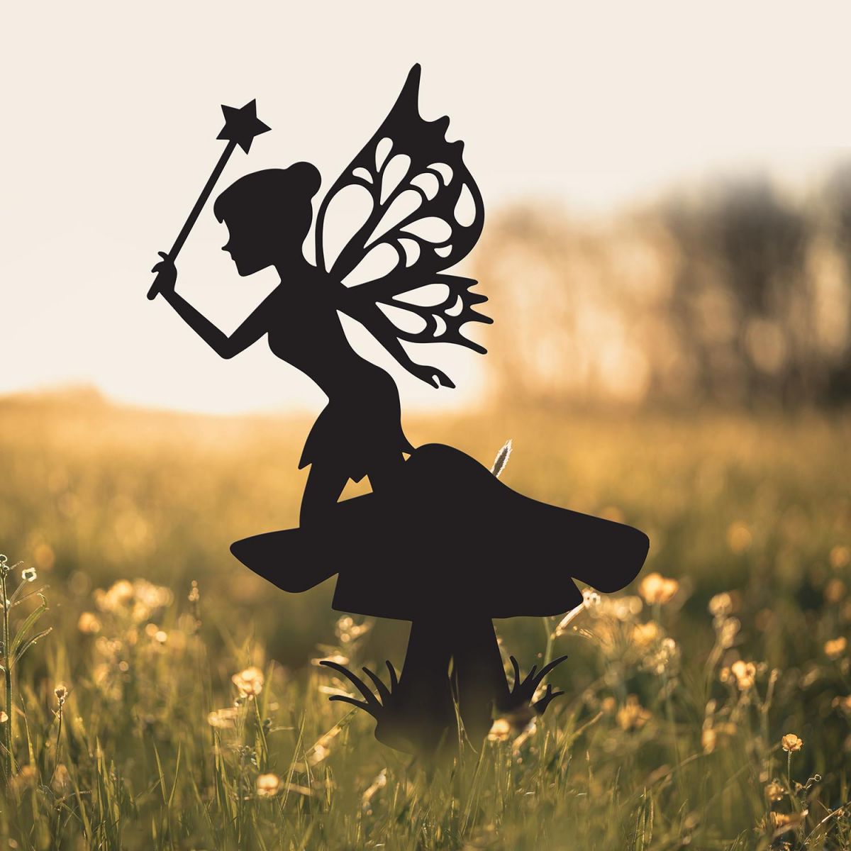 Flower Fairy With Wand Silhouette in Use in a Field Flower Fairy With Wand Silhouette in Use in a Field